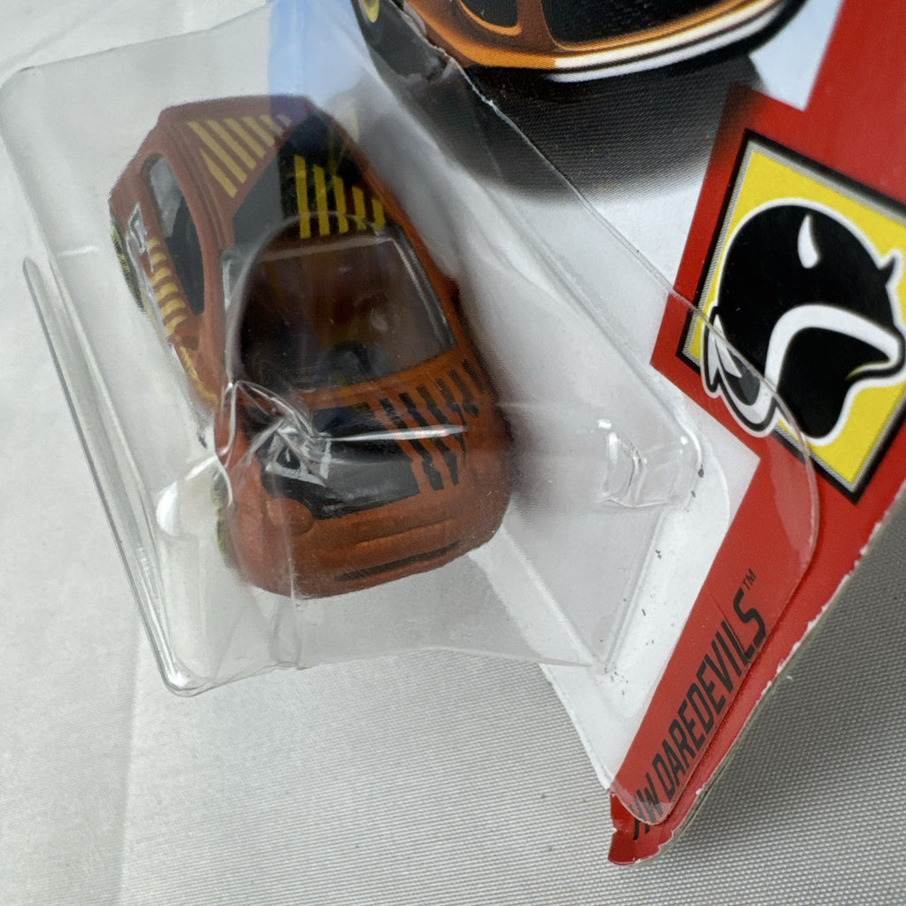 Hot Wheels Fiat 500 diecast car in bright orange sealed in HW Daredevils short card packaging