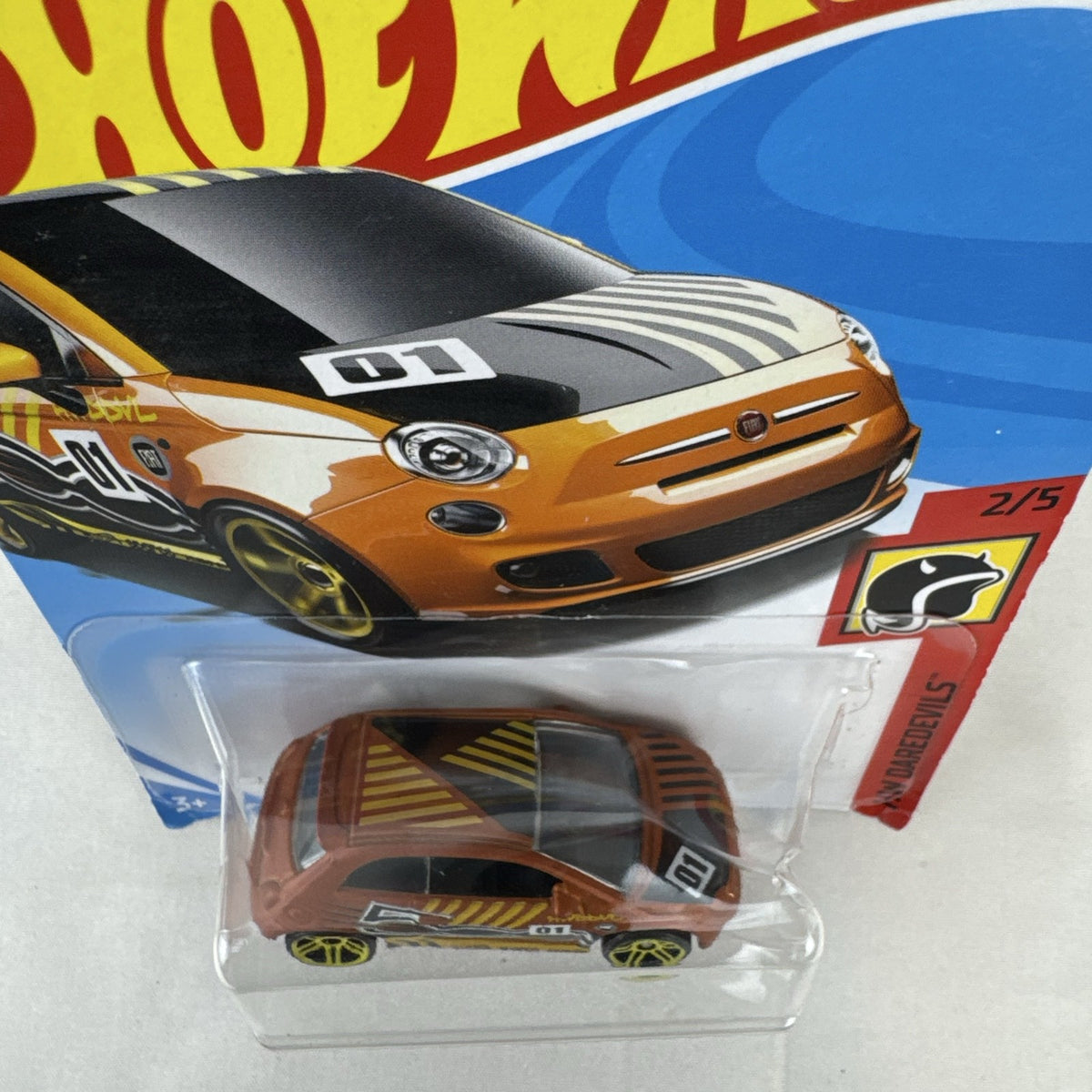 Hot Wheels Fiat 500 diecast car in bright orange sealed in HW Daredevils short card packaging