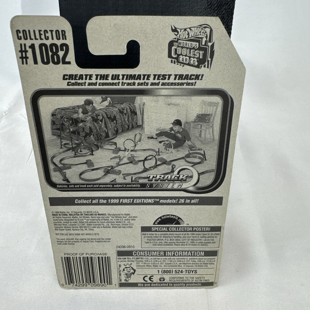 Hot Wheels 1:64 scale Jaguar XJ220 diecast car in metallic gold with 3-spoke wheels on unopened original card.