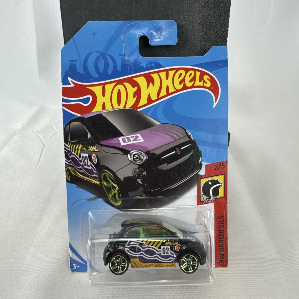 Hot Wheels HW Daredevils Fiat 500 diecast car in black with green wheels in original packaging