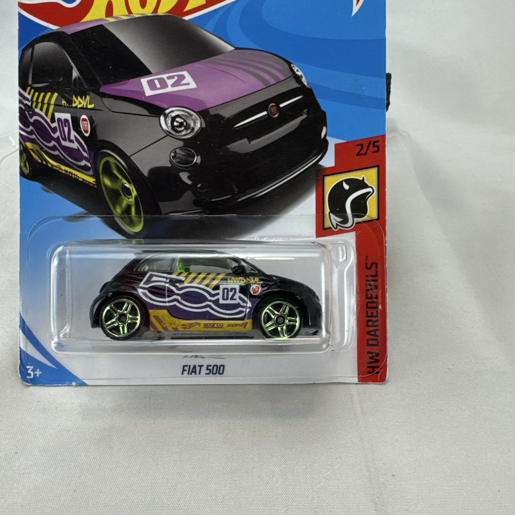 Hot Wheels HW Daredevils Fiat 500 diecast car in black with green wheels in original packaging