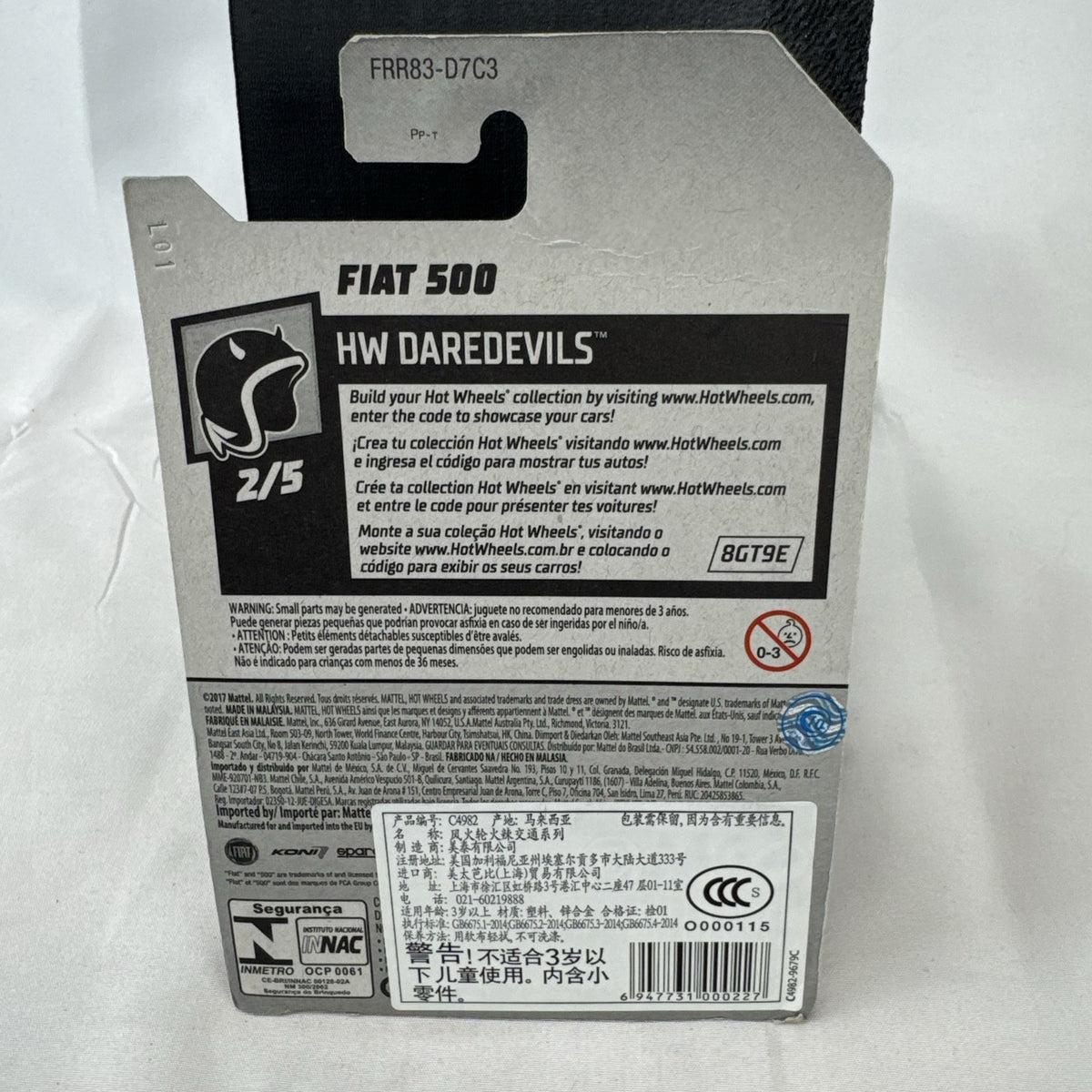 Hot Wheels HW Daredevils Fiat 500 diecast car in black with green wheels in original packaging