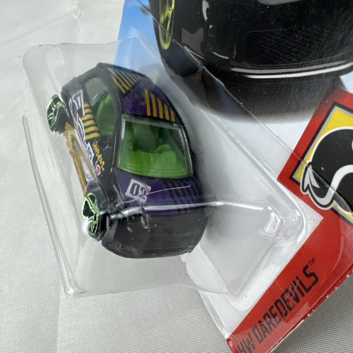 Hot Wheels HW Daredevils Fiat 500 diecast car in black with green wheels in original packaging