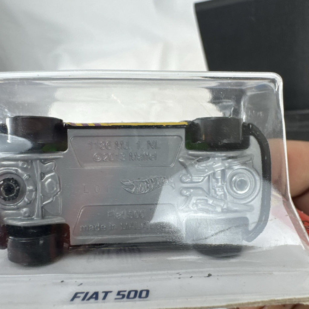 Hot Wheels HW Daredevils Fiat 500 diecast car in black with green wheels in original packaging