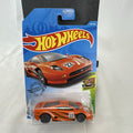 Hot Wheels HW Exotics 1:64 scale Jaguar XJ220 diecast car in bright orange racing livery sealed on original card