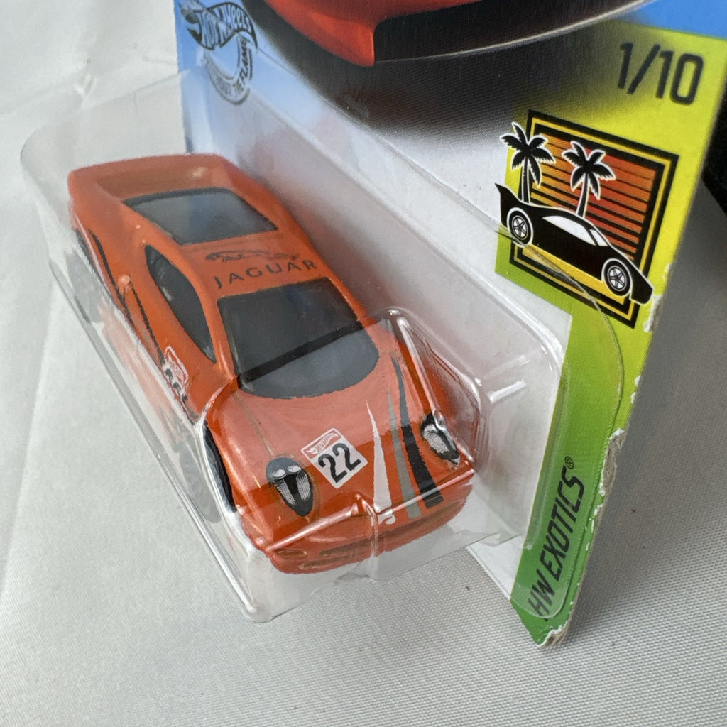 Hot Wheels HW Exotics 1:64 scale Jaguar XJ220 diecast car in bright orange racing livery sealed on original card