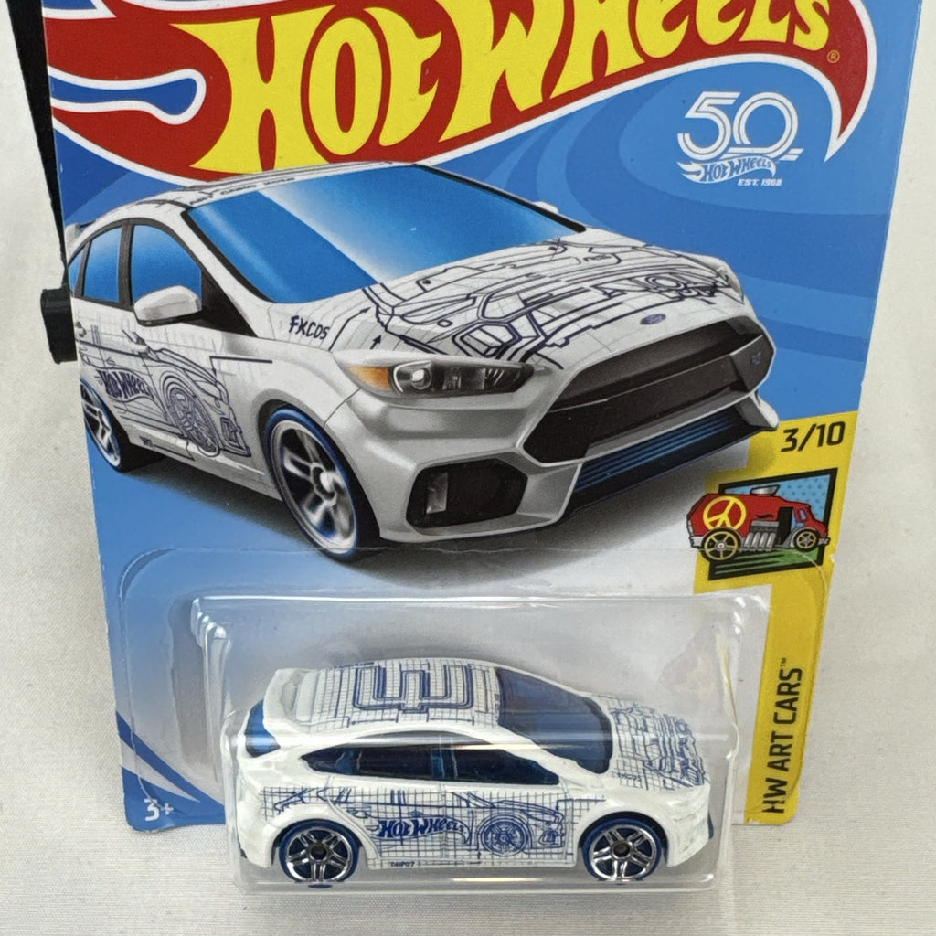 Hot Wheels 1:64 Ford Focus RS diecast car in white with blue blueprint graphics from the HW Art Cars series