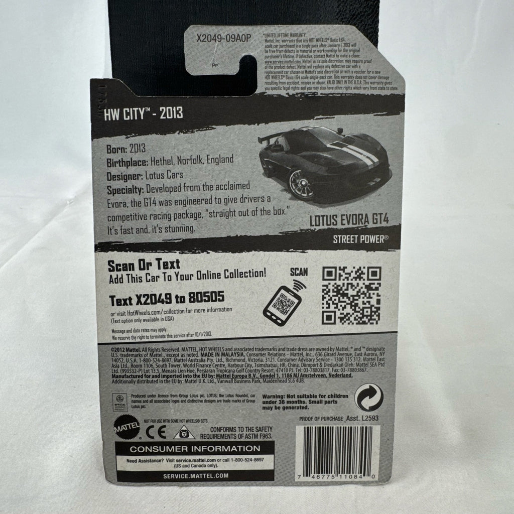Hot Wheels 1:64 scale Lotus Evora GT4 diecast car in black with yellow stripes, factory sealed on original card