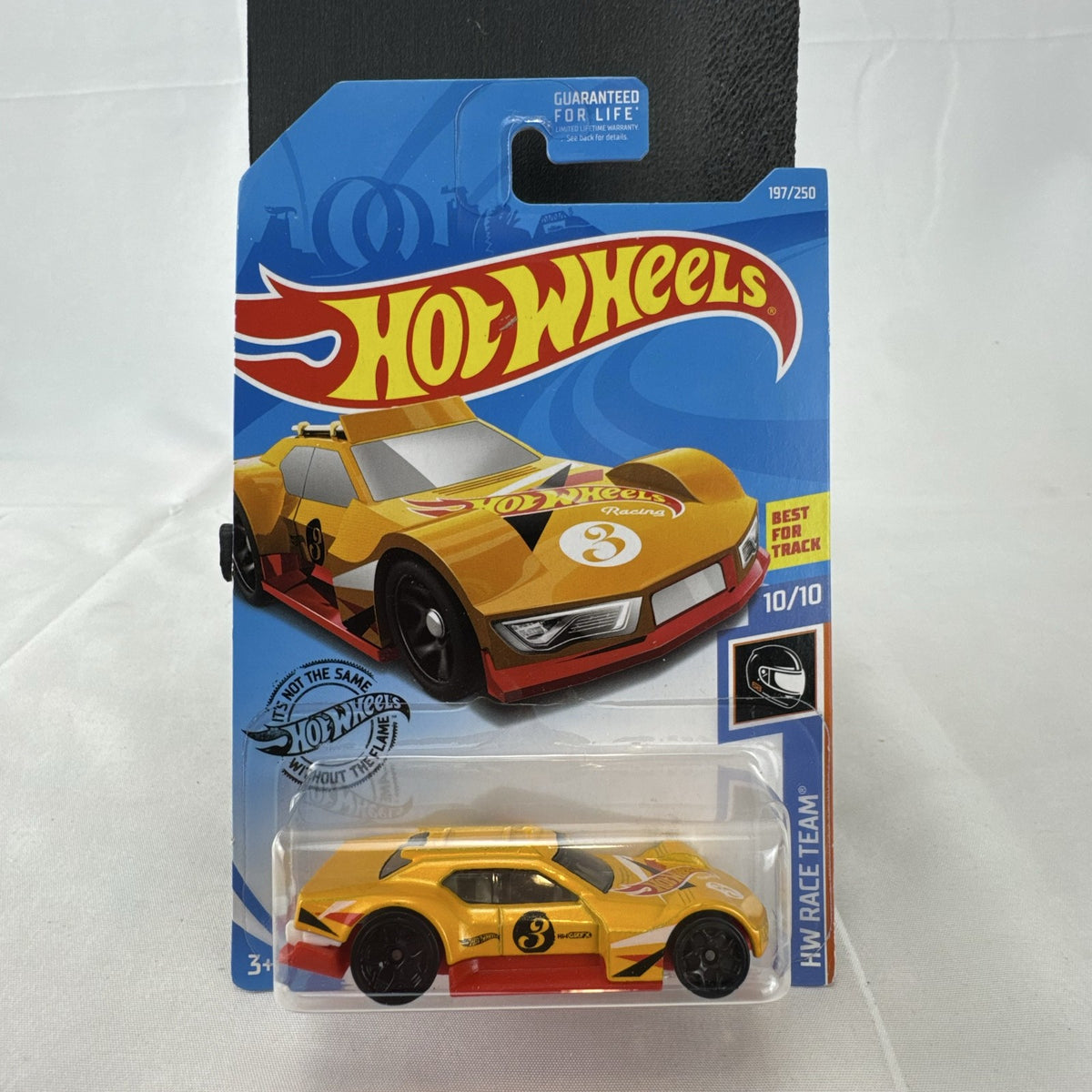 Yellow Hot Wheels 1:64 Driftsta diecast car in factory sealed HW Race Team blister card packaging