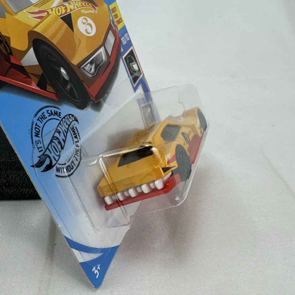 Yellow Hot Wheels 1:64 Driftsta diecast car in factory sealed HW Race Team blister card packaging