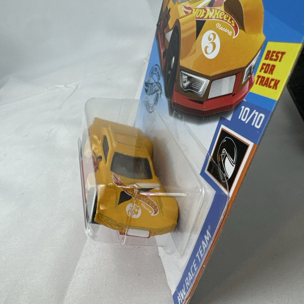 Yellow Hot Wheels 1:64 Driftsta diecast car in factory sealed HW Race Team blister card packaging
