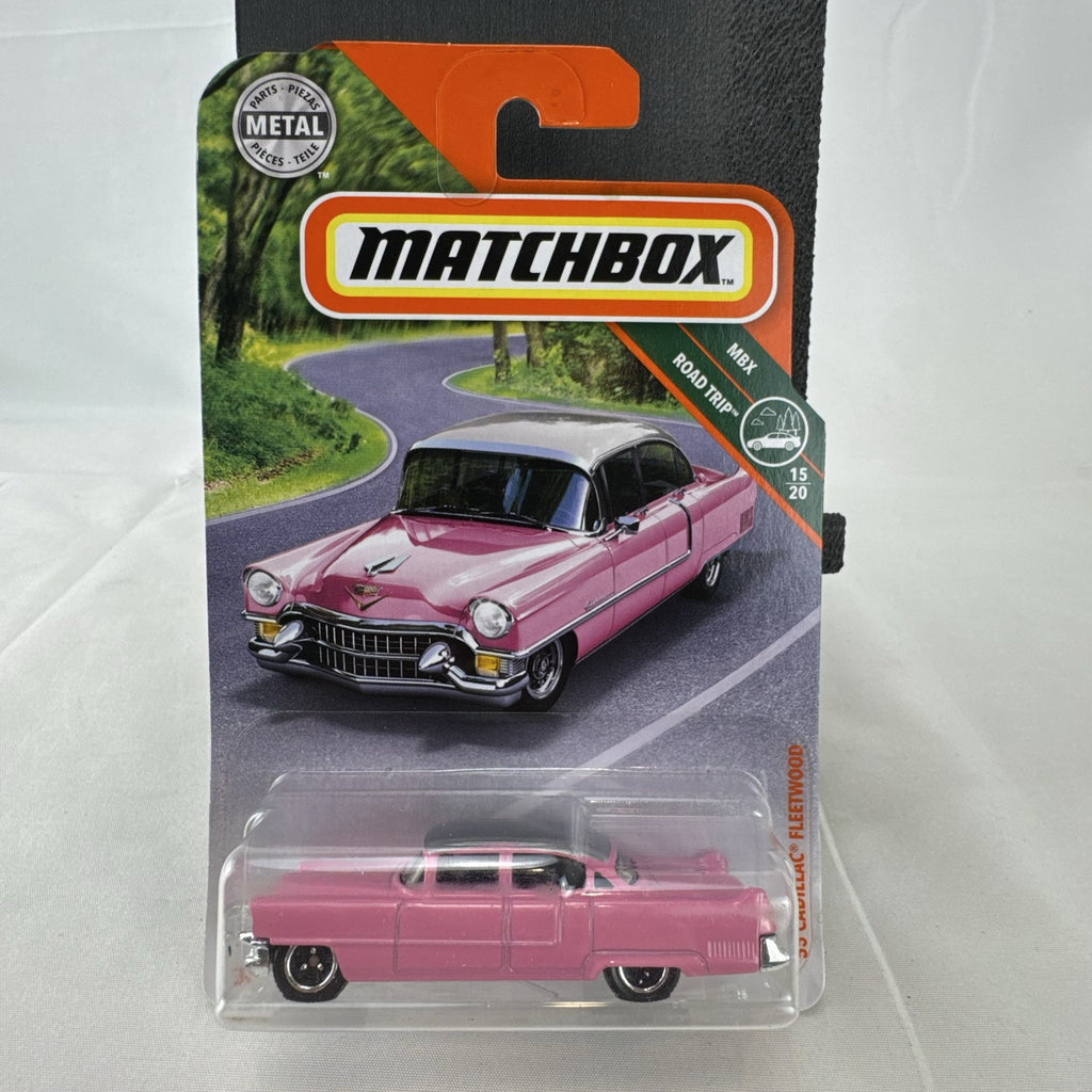 Matchbox 1:64 scale 1955 Cadillac Fleetwood diecast car in pink with grey roof sealed on original backing card.
