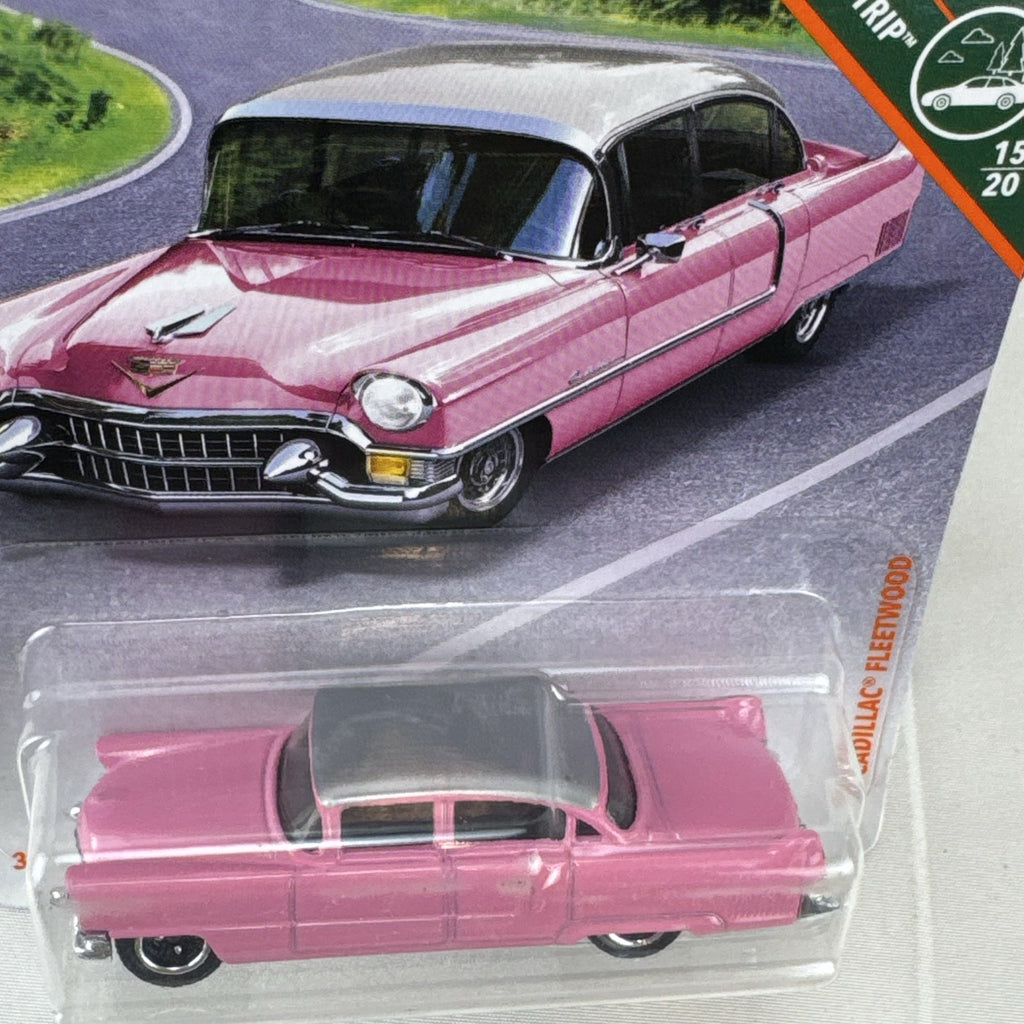 Matchbox 1:64 scale 1955 Cadillac Fleetwood diecast car in pink with grey roof sealed on original backing card.