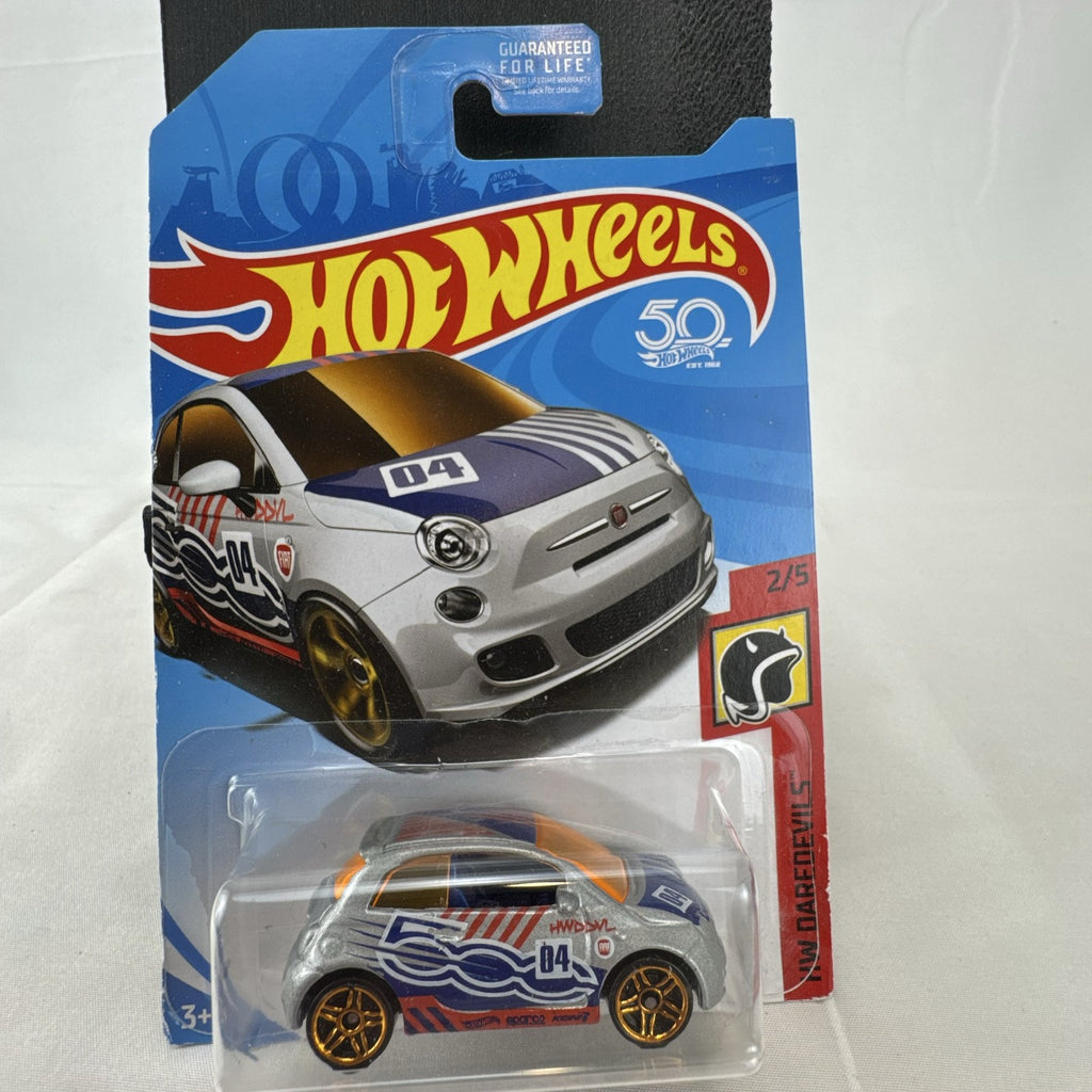 Hot Wheels Fiat 500 1:64 scale silver diecast car in original HW Daredevils 50th Anniversary carded packaging.
