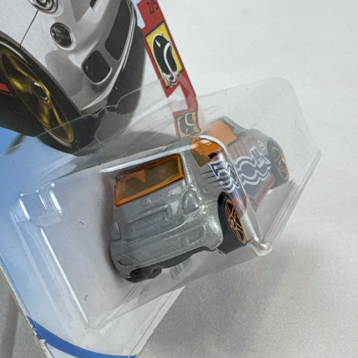 Hot Wheels Fiat 500 1:64 scale silver diecast car in original HW Daredevils 50th Anniversary carded packaging.