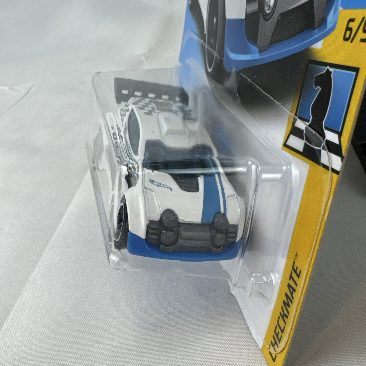Hot Wheels Fast 4WD Checkmate series Pawn white 1:64 scale diecast car in original unopened packaging.