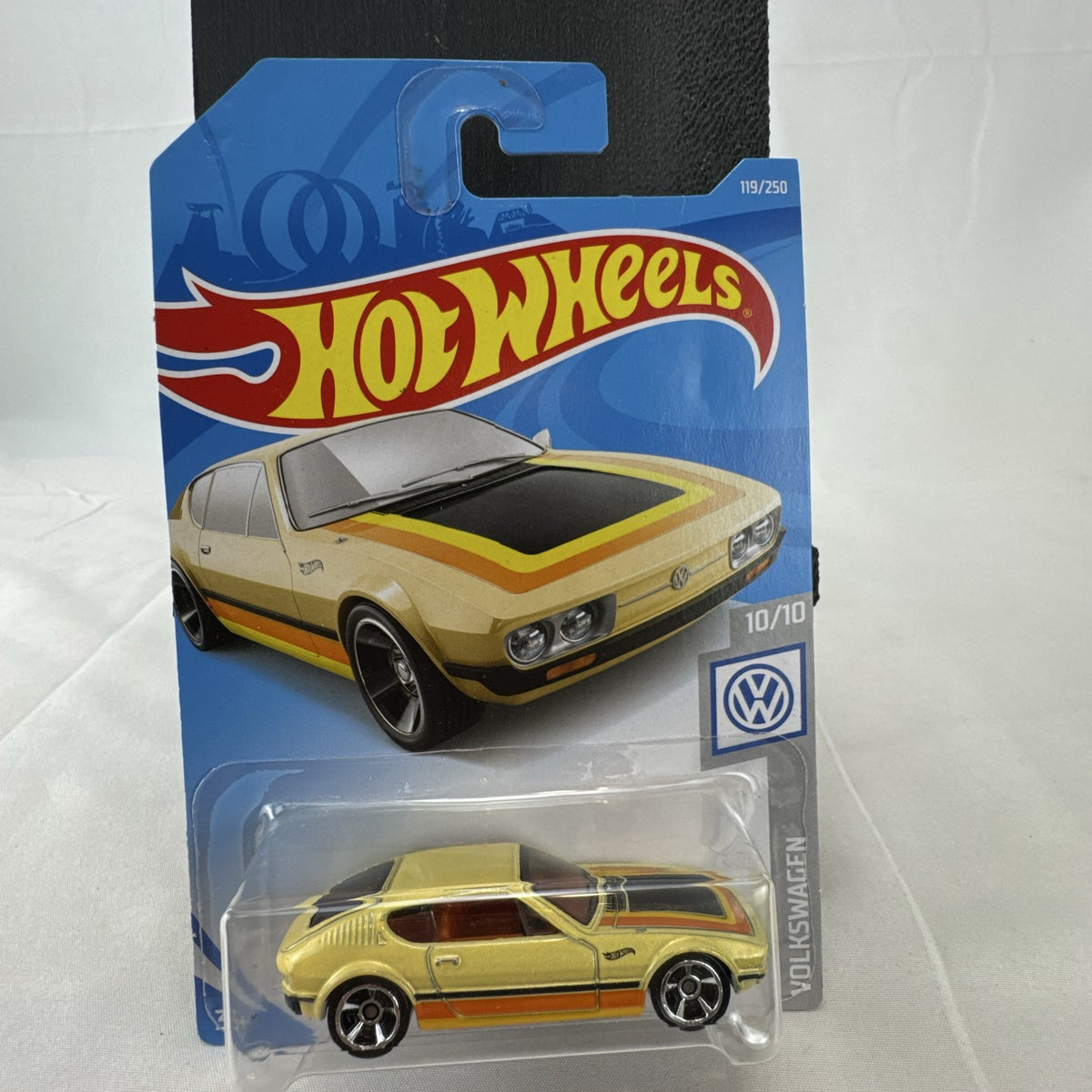 Hot Wheels 1:64 scale Volkswagen SP2 diecast car in metallic gold on original blister packaging.