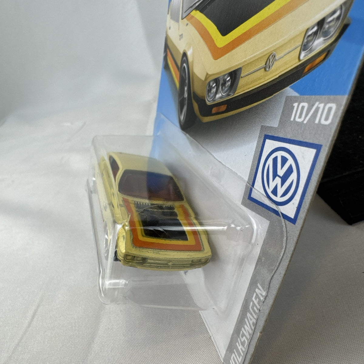 Hot Wheels 1:64 scale Volkswagen SP2 diecast car in metallic gold on original blister packaging.