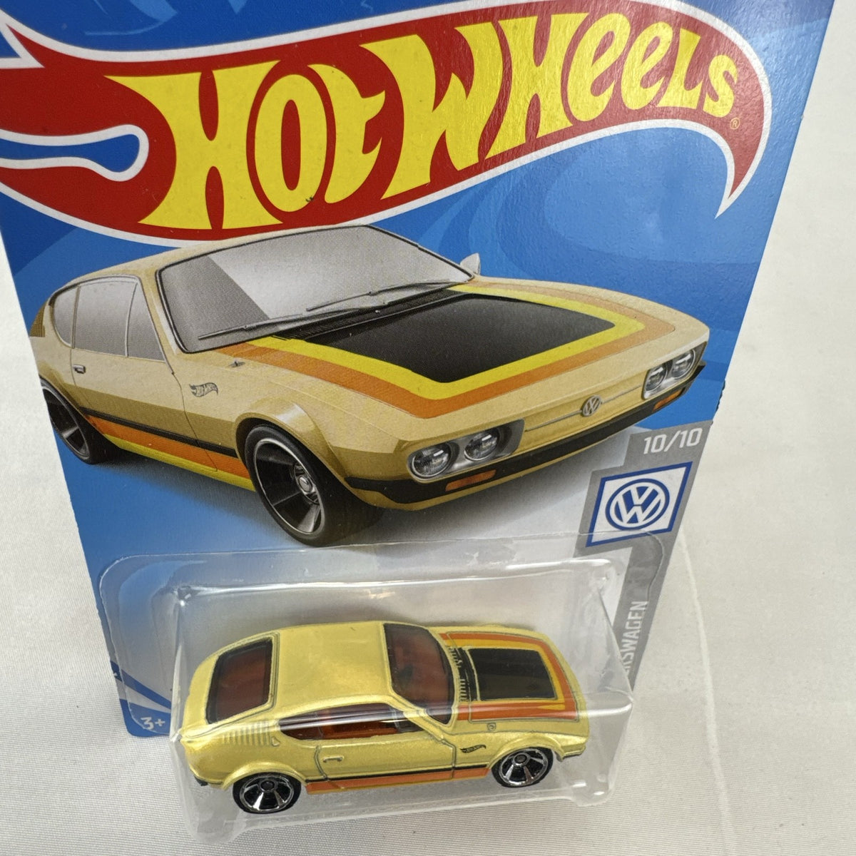 Hot Wheels 1:64 scale Volkswagen SP2 diecast car in metallic gold on original blister packaging.