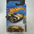 Factory sealed Hot Wheels ElecTrack 1:64 diecast car in gold chrome with red and white racing stripes on original card.