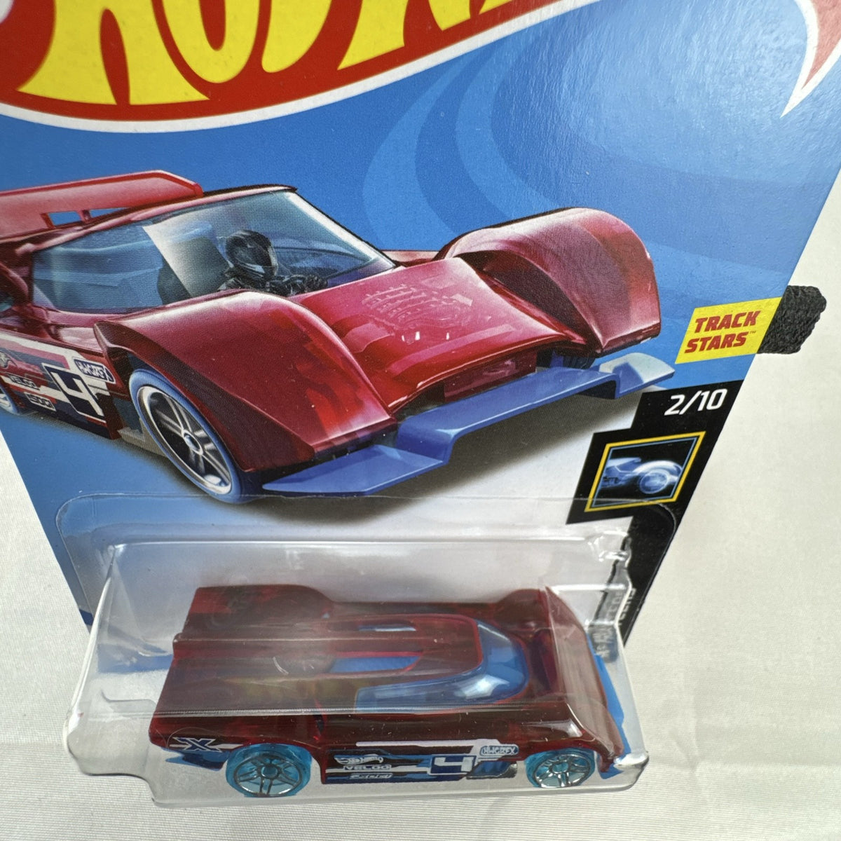 Hot Wheels Gruppo x24 1:64 scale diecast car in translucent red on original blister card