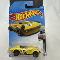 Hot Wheels Chevrolet Corvette Grand Sport Roadster diecast car in yellow on blister card