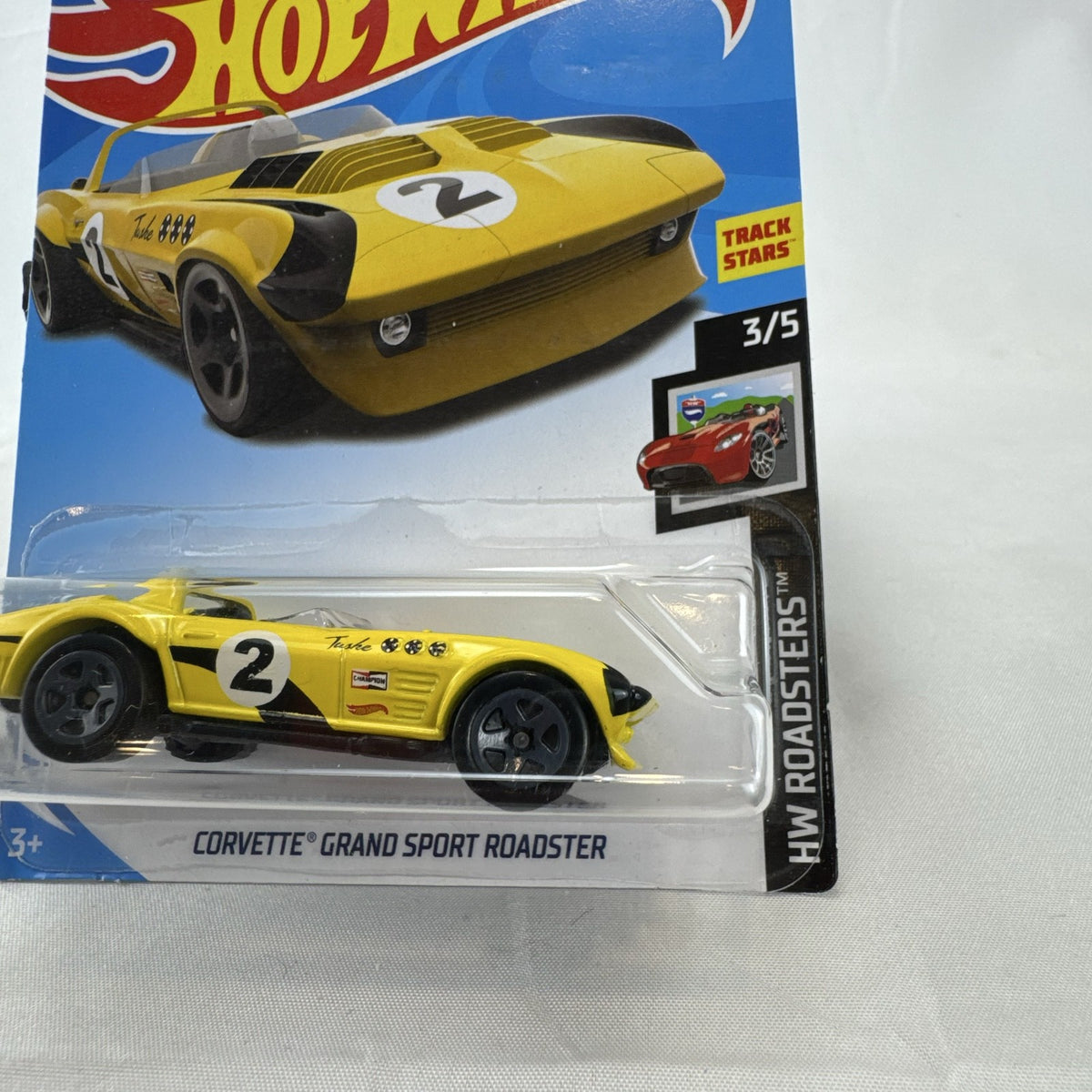 Hot Wheels 1:64 scale yellow Chevrolet Corvette Grand Sport Roadster sealed diecast car in original packaging