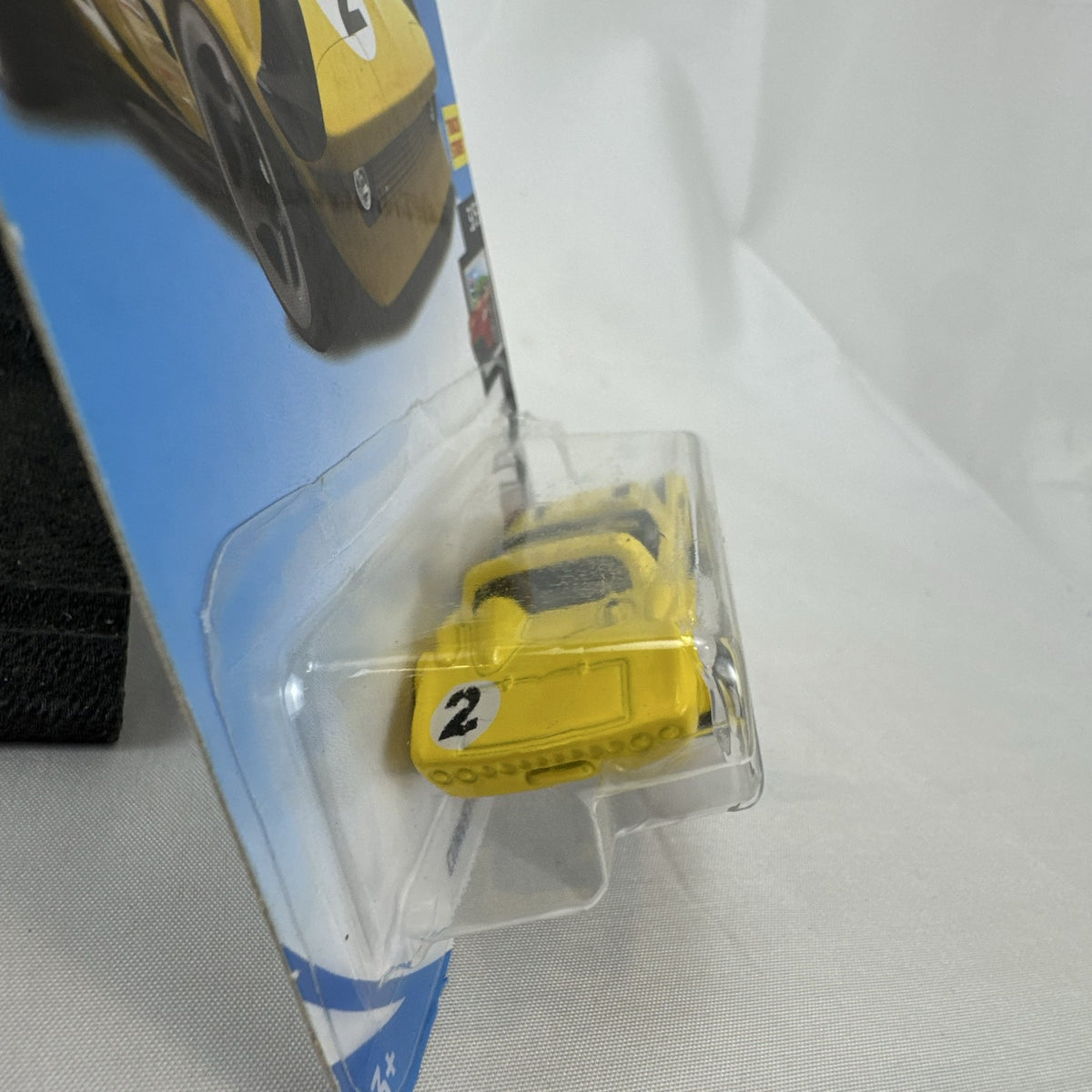 Hot Wheels 1:64 scale yellow Chevrolet Corvette Grand Sport Roadster sealed diecast car in original packaging