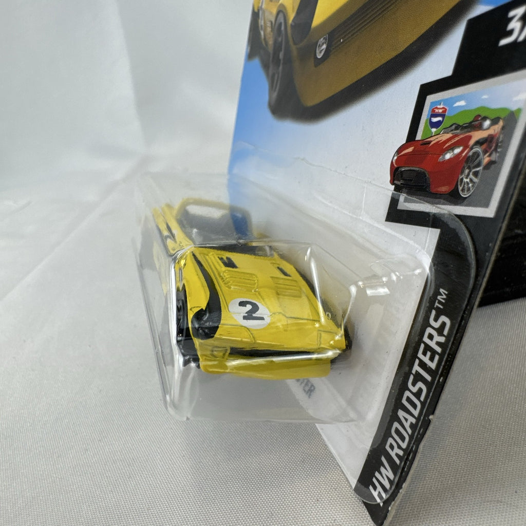 Hot Wheels 1:64 scale yellow Chevrolet Corvette Grand Sport Roadster sealed diecast car in original packaging