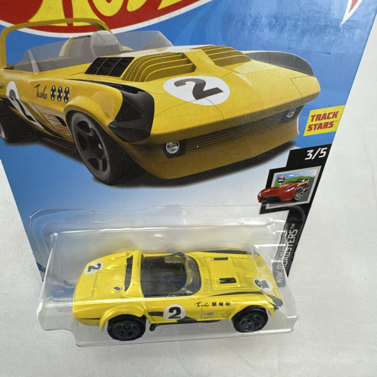 Hot Wheels 1:64 scale yellow Chevrolet Corvette Grand Sport Roadster sealed diecast car in original packaging