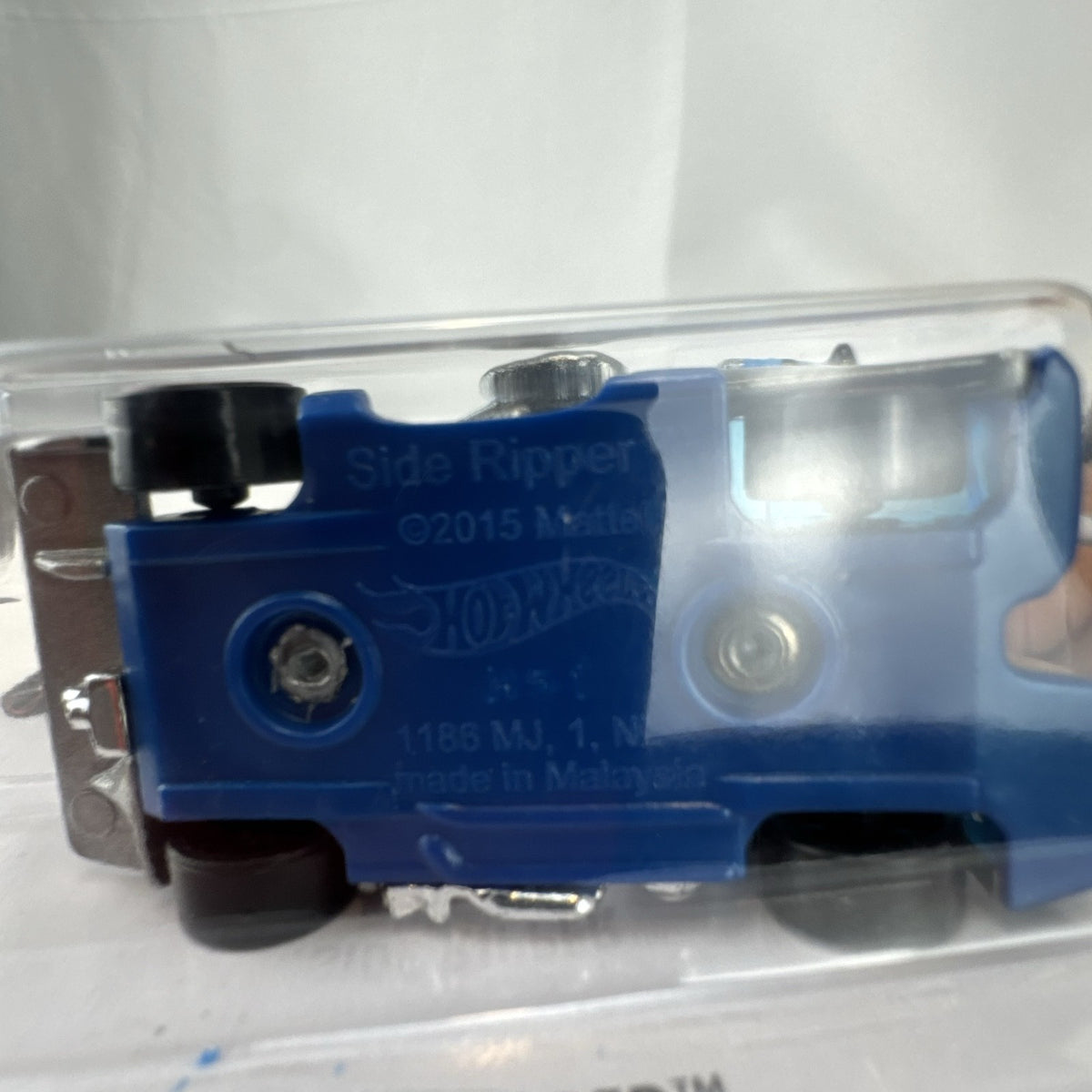 Hot Wheels Side Ripper 1:64 scale diecast racer in metalflake silver packaging