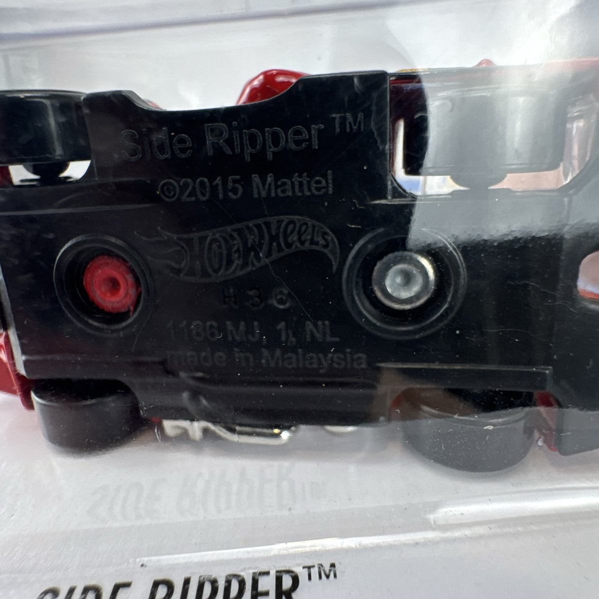 Hot Wheels 1:64 scale Side Ripper diecast car in red with flame graphics sealed on original 2016 card