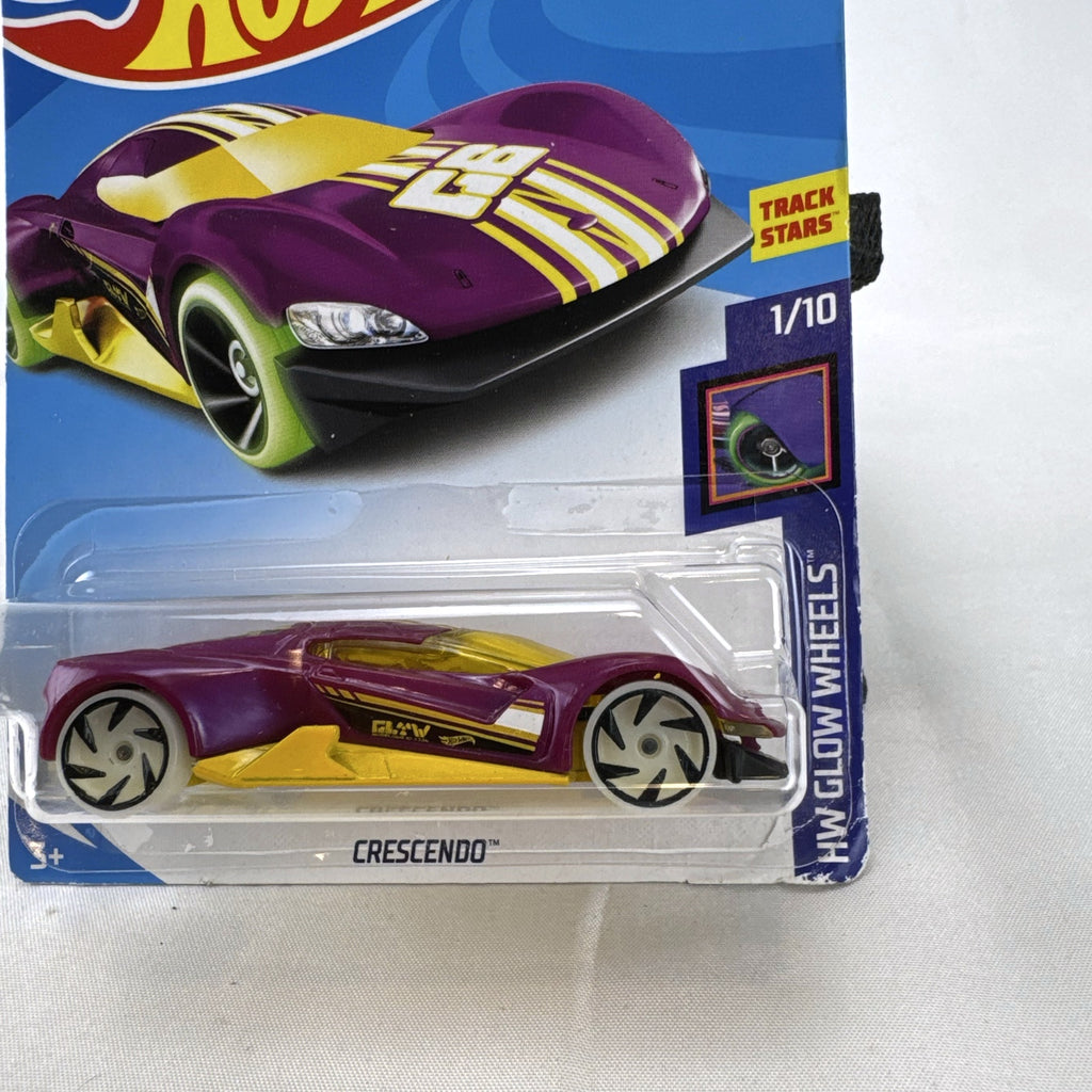 Hot Wheels 1:64 scale purple Crescendo diecast car factory sealed on 2017 HW Glow Wheels blister card.