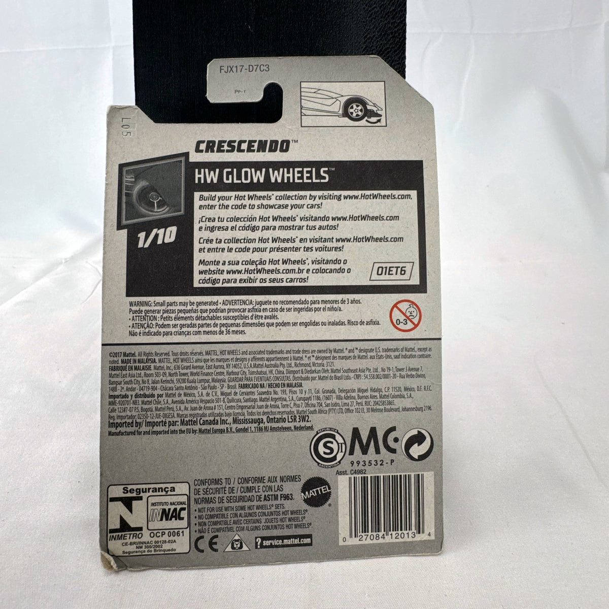 Hot Wheels 1:64 scale purple Crescendo diecast car factory sealed on 2017 HW Glow Wheels blister card.