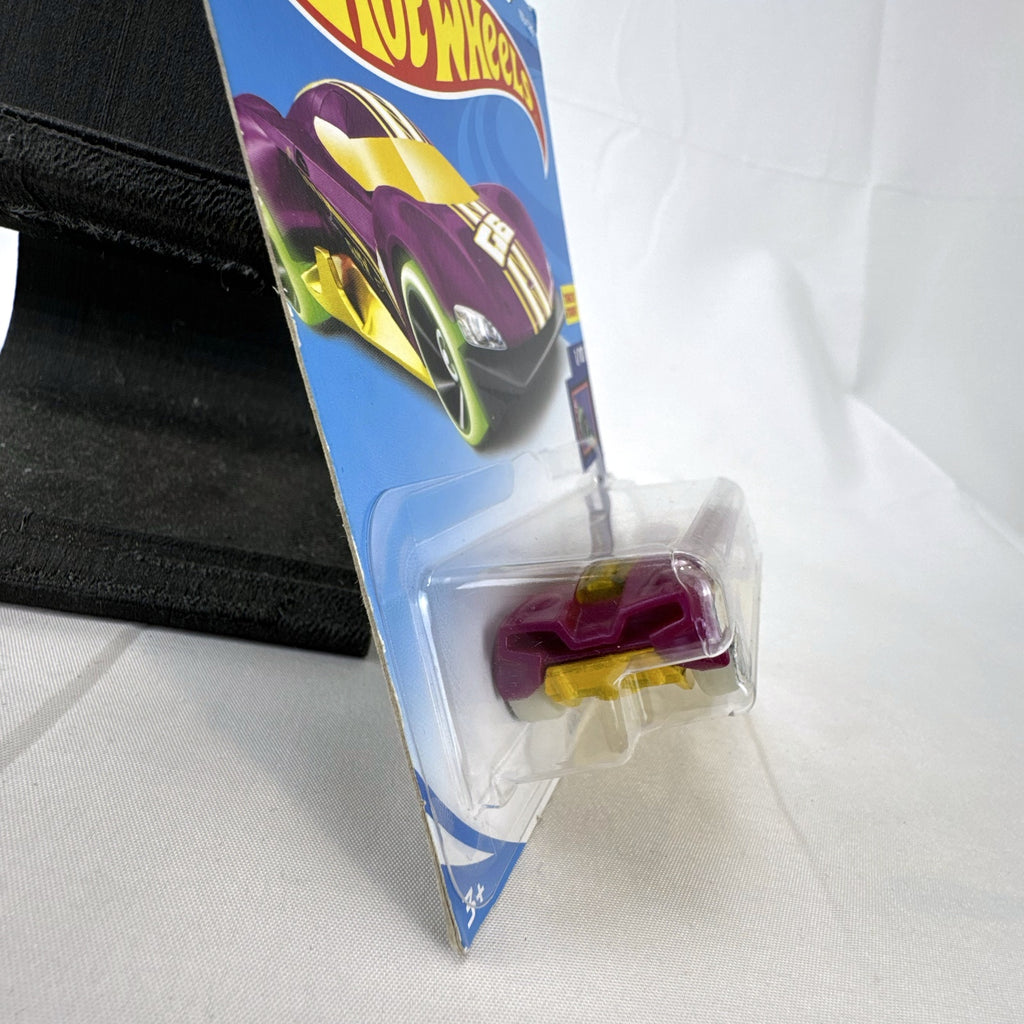 Hot Wheels 1:64 scale purple Crescendo diecast car factory sealed on 2017 HW Glow Wheels blister card.