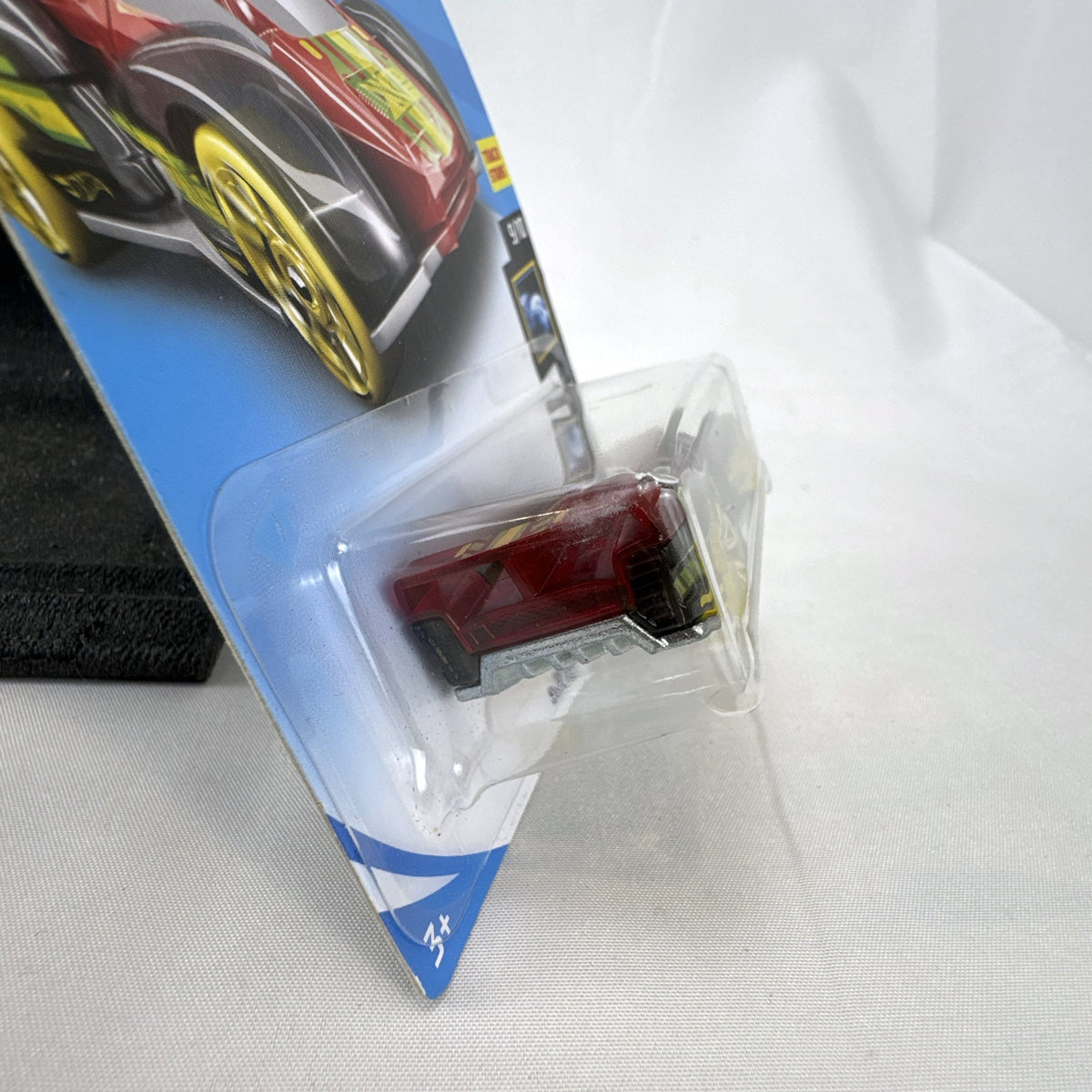 Hot Wheels Electrack 1:64 diecast car in translucent red sealed on original blister card