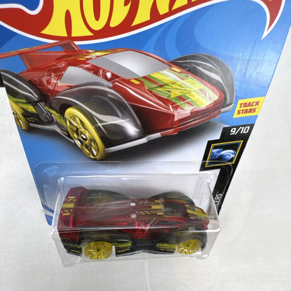 Hot Wheels Electrack diecast car in translucent red from the X-Raycers series factory sealed on card.