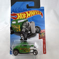 Sealed Hot Wheels 1:64 scale 1932 Ford coupe diecast car in green with HW Flames deco.