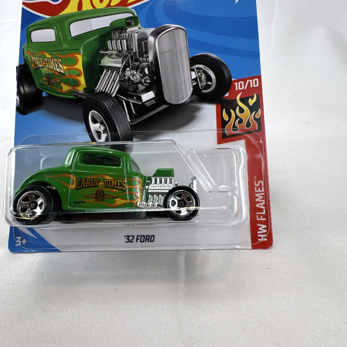 Sealed Hot Wheels 1:64 scale 1932 Ford coupe diecast car in green with HW Flames deco.