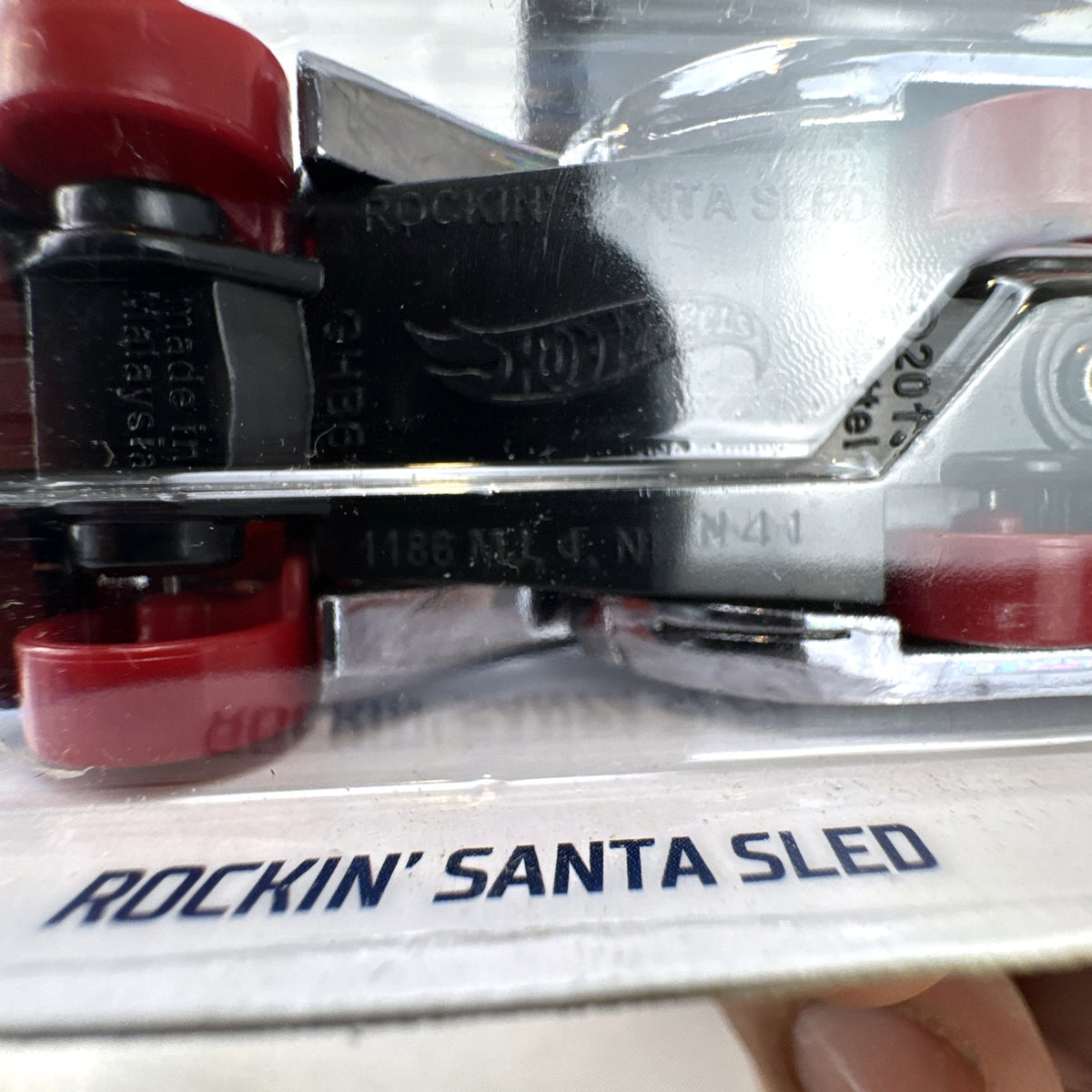 Hot Wheels Rockin' Santa Sled 1:64 scale diecast car sealed on Holiday Racers blister card