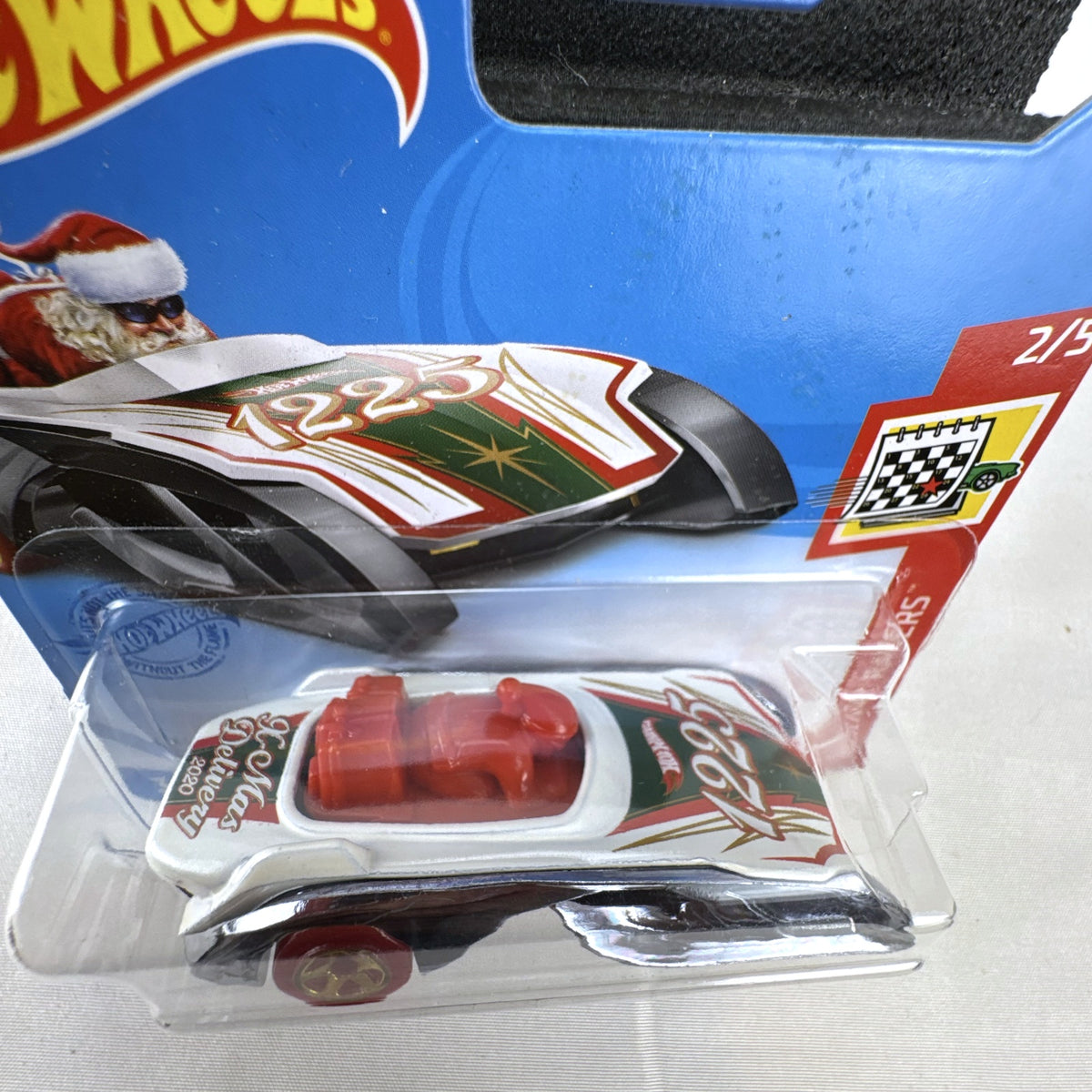Hot Wheels Rockin' Santa Sled 1:64 scale diecast car sealed on Holiday Racers blister card