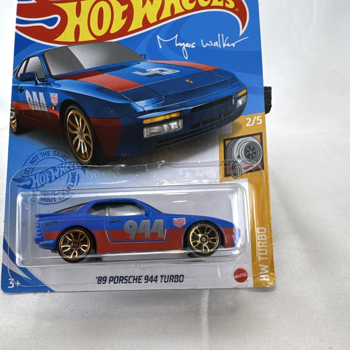 Hot Wheels 1:64 scale 1989 Porsche 944 Turbo in blue with Magnus Walker Urban Outlaw livery on card