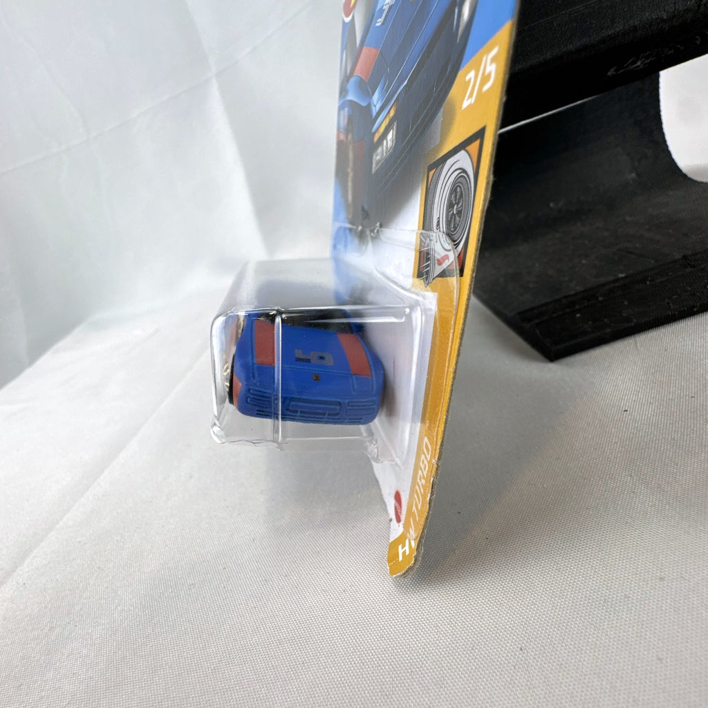 Hot Wheels 1:64 scale 1989 Porsche 944 Turbo in blue with Magnus Walker Urban Outlaw livery on card