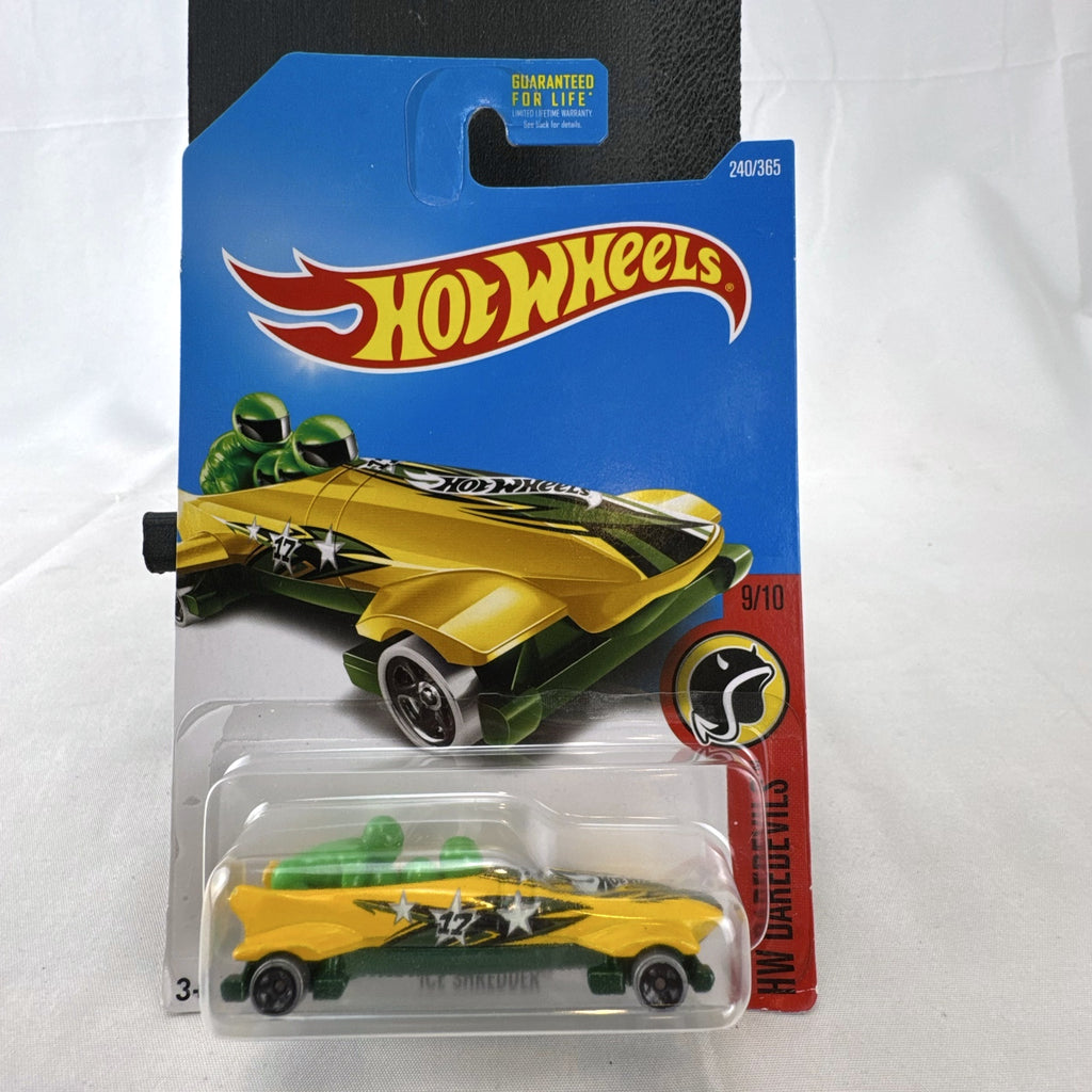 Hot Wheels Ice Shredder diecast bobsled vehicle in yellow and green, factory sealed on original HW Daredevils card.