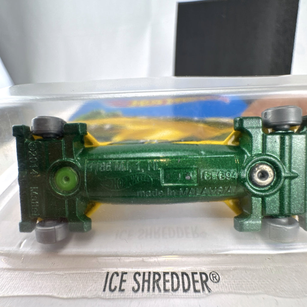 Hot Wheels Ice Shredder diecast bobsled vehicle in yellow and green, factory sealed on original HW Daredevils card.