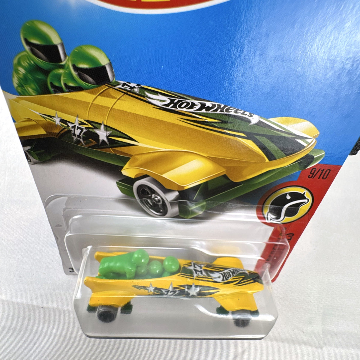 Hot Wheels Ice Shredder diecast bobsled vehicle in yellow and green, factory sealed on original HW Daredevils card.