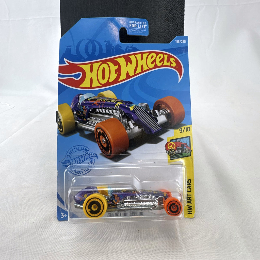 Hot Wheels 1:64 scale Rocket Oil Special diecast streamliner in purple art splatter card packaging