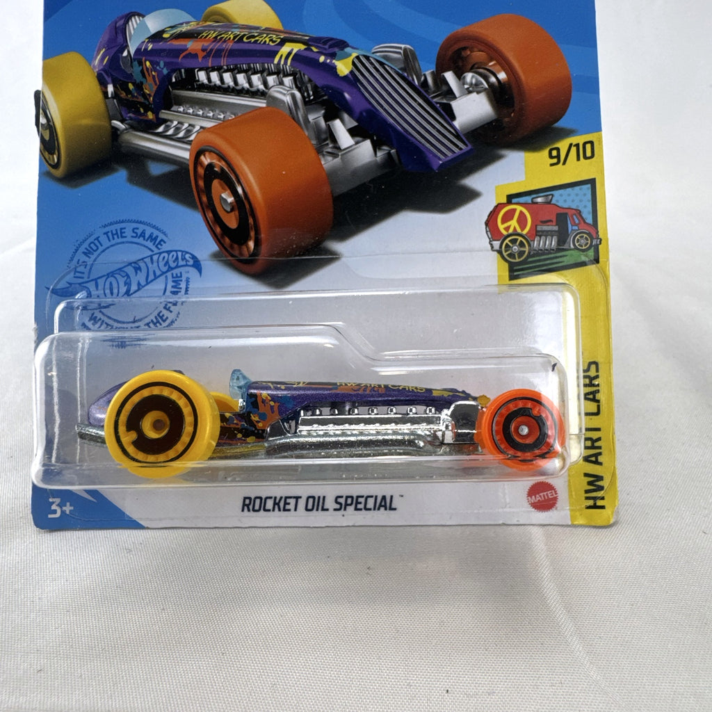 Hot Wheels 1:64 scale Rocket Oil Special diecast streamliner in purple art splatter card packaging