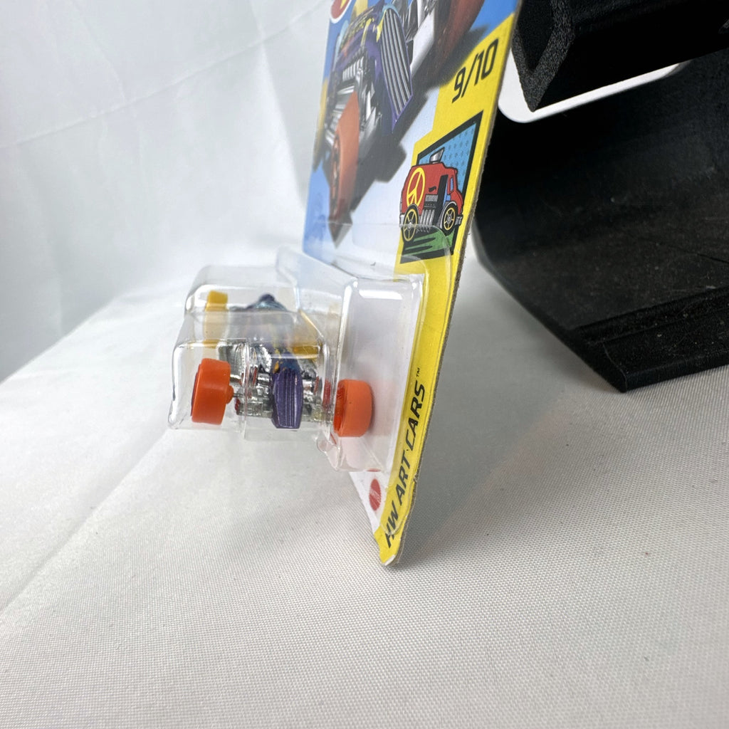 Hot Wheels 1:64 scale Rocket Oil Special diecast streamliner in purple art splatter card packaging