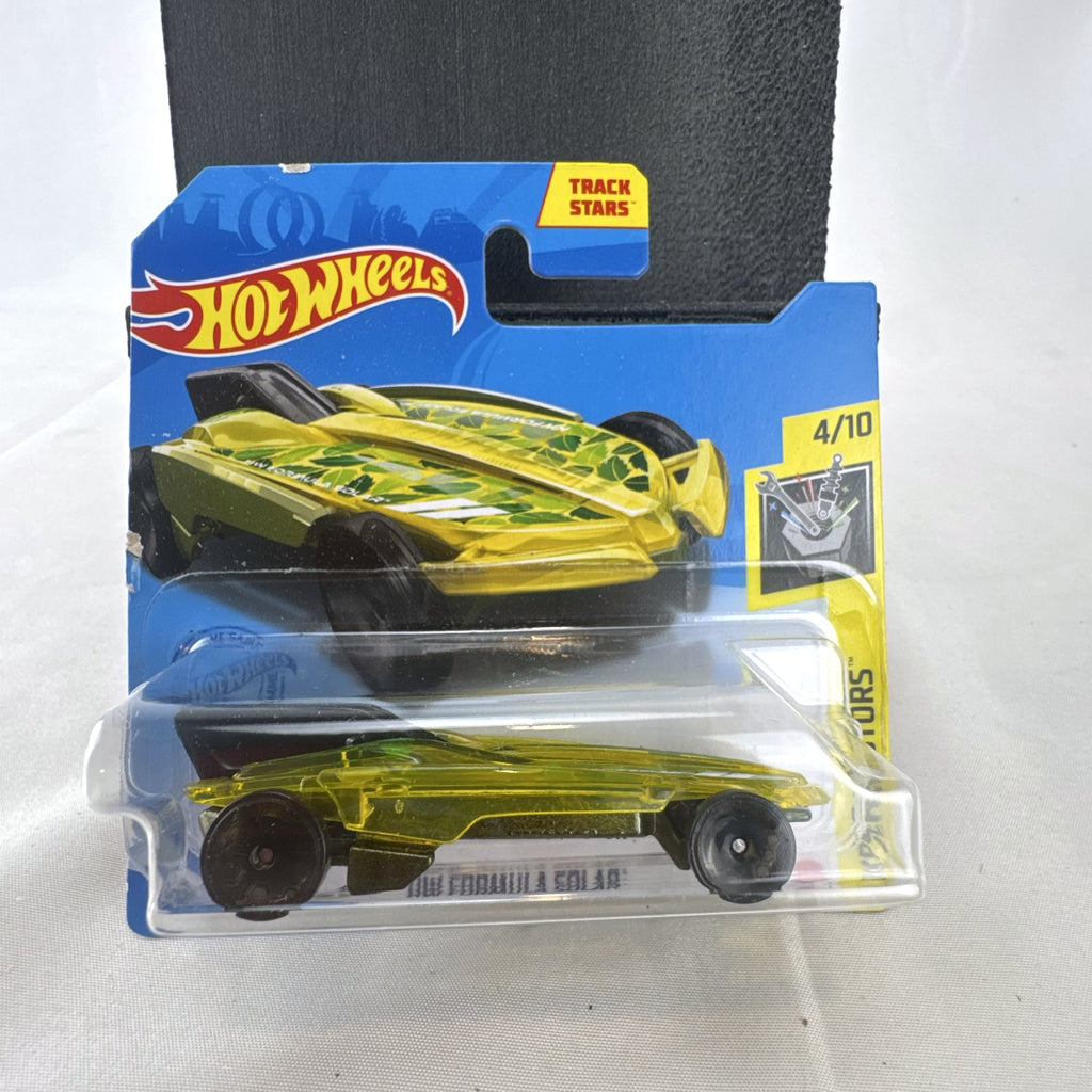 Hot Wheels 1:64 scale HW Formula Solar diecast car in translucent yellow on original blister card